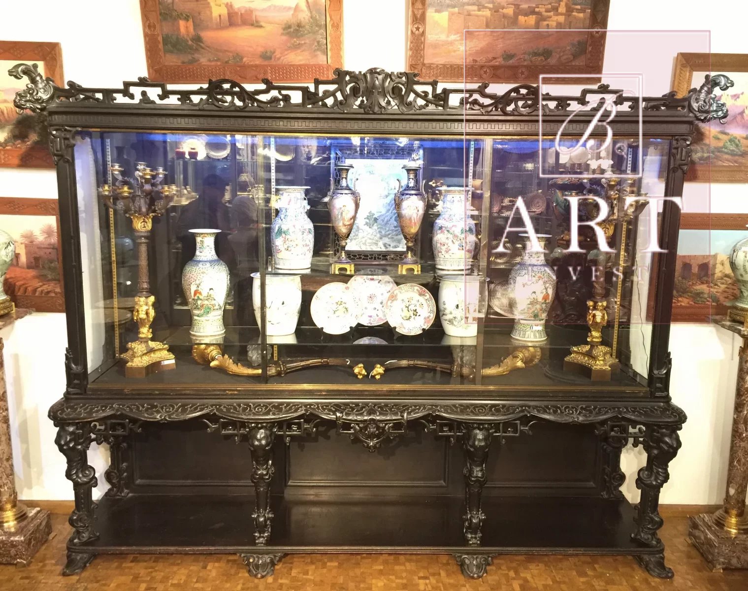 Importante showcase in blackened wood, 19th century, attribued to "La maison du Bamboux".