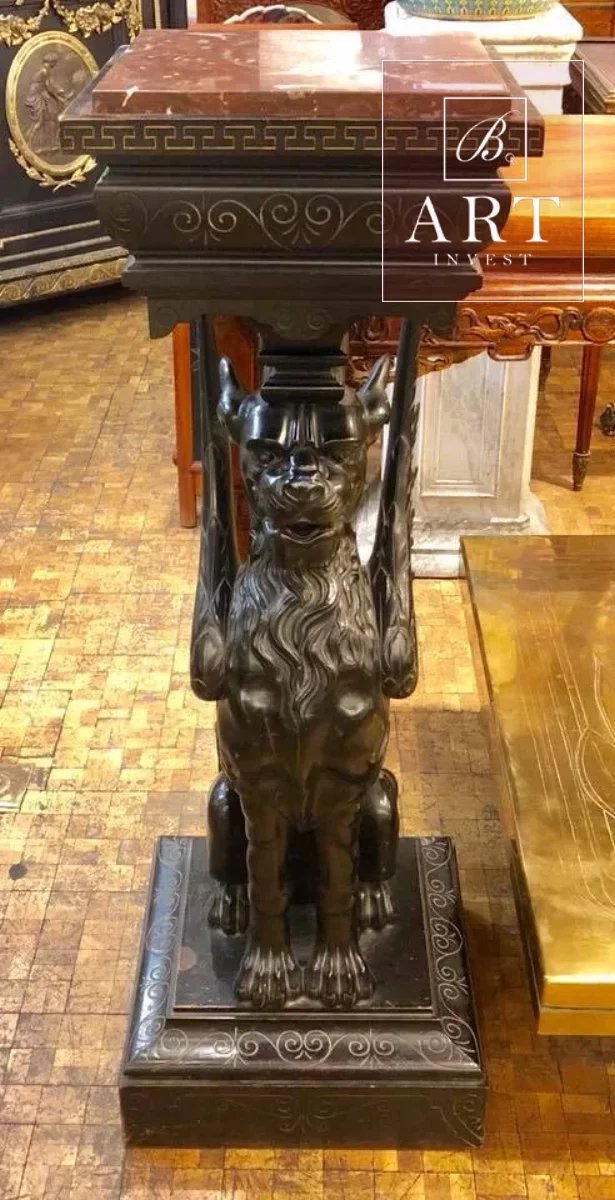 A 19th century pair of carved wood pedestales.